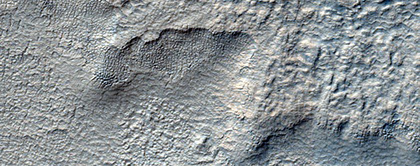 Layered Feature in Pedestal Crater in Hellas Planitia