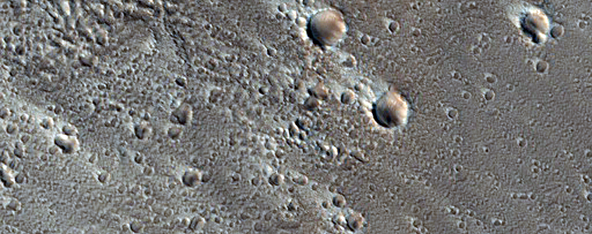 Flows and Valleys in Northern Lycus Sulci