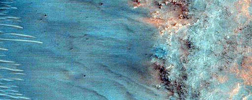 Possible Phyllosilicate Exposure in Nirgal Vallis