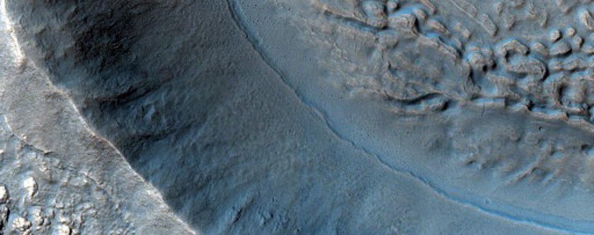 Channel and Trough in Claritas Fossae