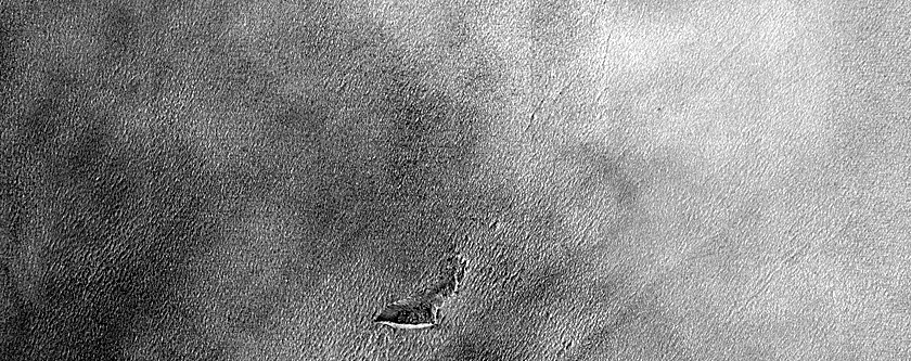 Possible New Ice Exposing Scarp in Northern Hemisphere