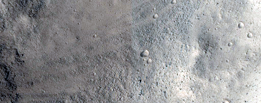 Crater on Rim of Kasei Valles