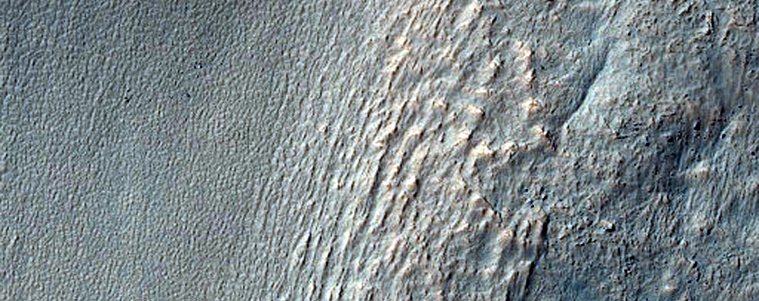 Flows on Crater Wall near Reull Vallis