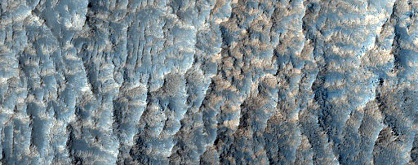 Channels in Claritas Fossae