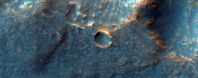 Impact Related Deposits and Flows in Tyrrhena Terra