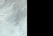 Possible Mafic Minerals Exposed by Hesperia Planum Craters