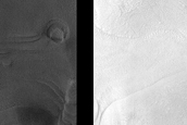 Dipping Layers near Mound in Hellas Planitia