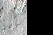 Strong Pyroxene Spectral Signatures in Eos Chasma