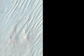 Possible Mafic Minerals Exposed by Solis Dorsa Crater