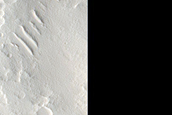 Intersection of Ejecta Rampart and Rim in Crater