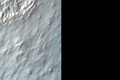 Possible Phyllosilicates in Hill Northwest of Hellas Planitia
