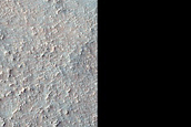Possible Hydrated Silicon in West Hellas Planitia