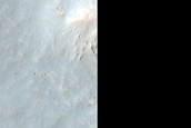 Possible Impact Related Flows Sourced from 4-Kilometer Well-Preserved Crater