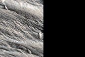 Possible Scour Pits adjacent to Yardangs in Southwest Olympus Mons