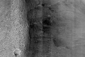 Possibly Olivine-Rich Materials on Dao Vallis Wall