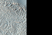 Possible Olivine-Rich Materials on Terra Sirenum Escarpment