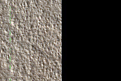 Graben-Crater Intersection at Tantalus Fossae