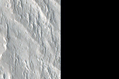 Contact between Medusae Fossae and Northern Flank of Apollinaris Mons