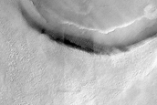 Buried Crater on Ice-Rich Plateau on Malea Patera