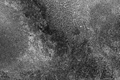 Spot Development Influenced by Underlying Terrain in Crater