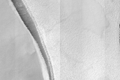 Eroded Scarp of Ice-Rich Plateau on Malea Patera