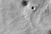 Flow Features on Ice-Rich Plateau on Malea Patera