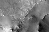 Possible Mafic Mineral Exposures in Crater within Schroeter Crater