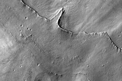 Collapse Feature in Icy Crater Fill