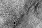 Fresh Crater near Ice-Rich Terrain