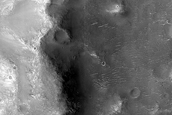 Terra Tyrrhena Crater Rim with Phyllosilicate-Rich Terrain