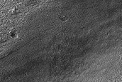 Possible Englacial Layer Outcrop in Euripus Mons