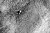 Fresh Crater near Ice-Rich Terrain