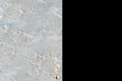 Ejecta Interactions with Preexisting Ridge