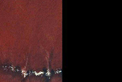Mesa Edge with Small Gullies Seen in MOC Image E11-03109 near Sisyphi Cavi