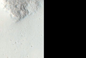 Possibly Olivine-Rich Materials around Crater in Tyrrhena Dorsa