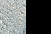Layered Deposits in Small Craters on Floor of Zulanka Crater