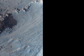 Leveed Feature on North-Facing Valles Marineris Wall Landslide or Glacier