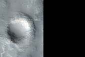 Monitoring New Icy Impact Crater