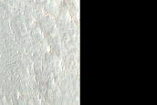 Stratigraphy of Gullies and Fans in 30-Kilometer Crater