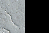 Rays of Small Dark Crater in North Tharsis Region