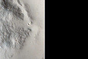 Flow Front Interaction with Pre-Existing Topography