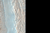Crater with Floor Filling Material in Noachis Region