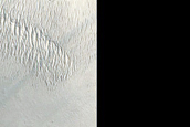 Crater Adjacent to Channel in Naktong Vallis