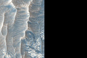 Interaction between Layer Types on East Rim of Crater