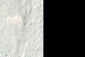 Pit in Mid-Latitude Mantle