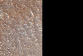 Lineated Valley Floor Material near Coloe Fossae
