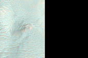 Possible Clay Deposit Exposed in Crater Rims South of Nirgal Vallis
