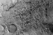 Scattered Dunes in Channel Northeast of Syrtis Major Planum