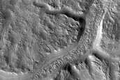 Channel along Crater Ejecta