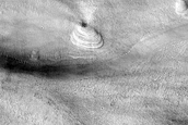 Layered Structures in Hellas Planitia